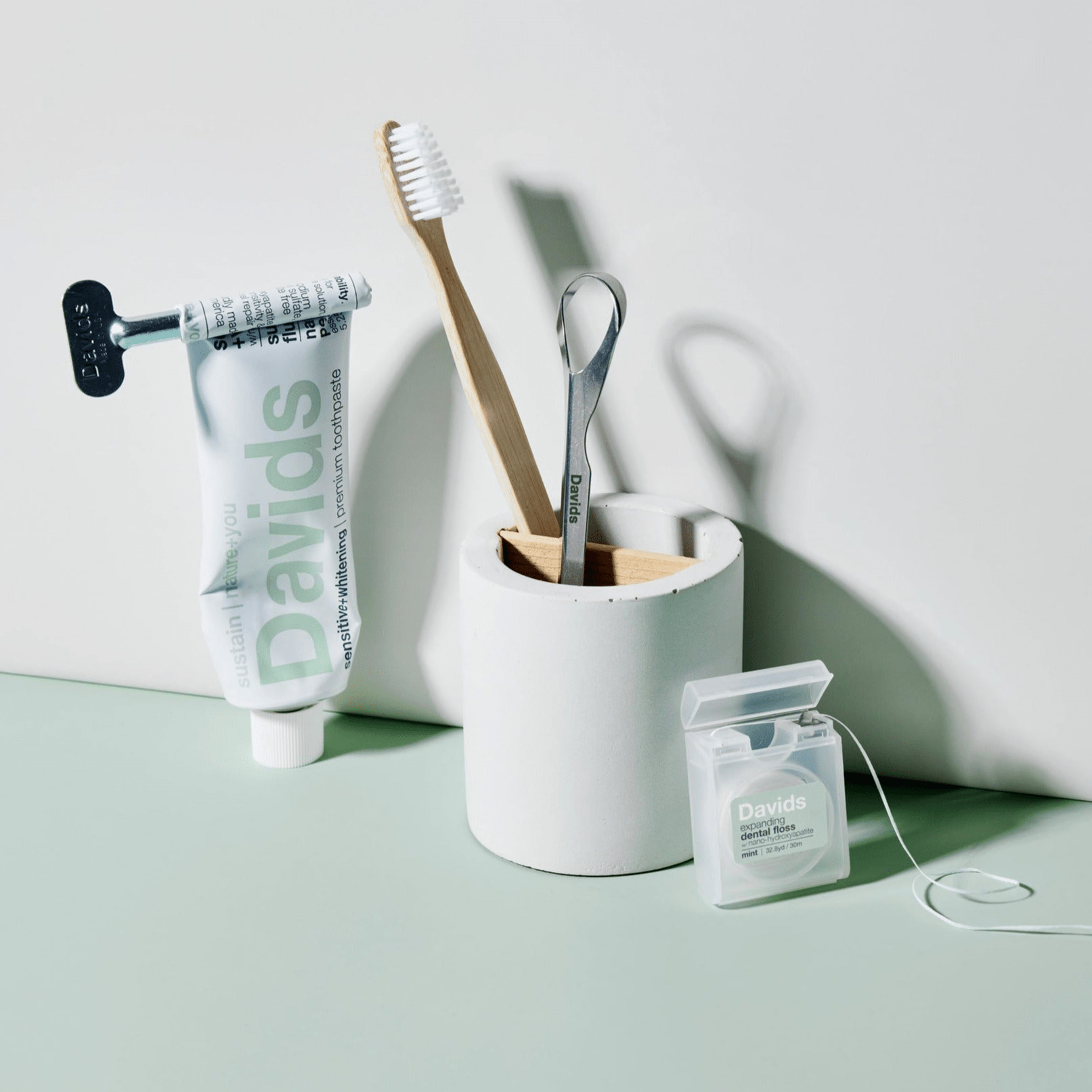 Davids essentials nano hydroxyapatite whitening bundle with hydroxi sensitive and whitening toothpaste expanding dental floss bamboo toothbrush and tongue scraper