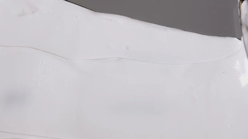 Load video: Davids Hydroxi nano hydroxyapatite toothpaste texture spread with logo clean and safe alternative to fluoride